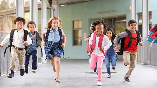 Kids running at school